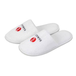 white cotton hotel slippers