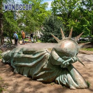 China Liberty Lying Diagonally Bronze Garden Sculptures In Park on sale