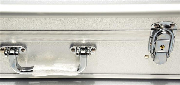 Silver aluminum hard storage suitcase for home and office use