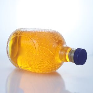 Unique Round Shape Embossed Food Grade Rum Vodka Whisky Tequila Gin Glass Bottle