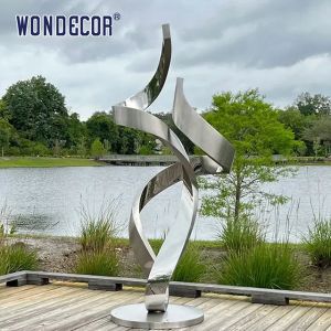 Large forged metal shaped twisted geometric stainless steel sculpture in the