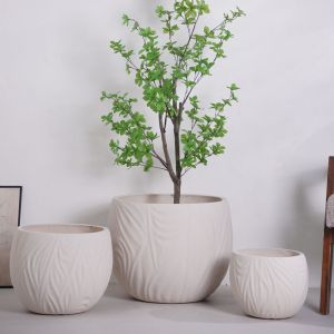 China Irregular Wavy Lines Pattern Neutral Beige Round Fiber Clay Planter on sale