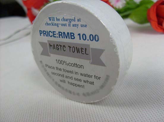 Cotton compressed hotel towel