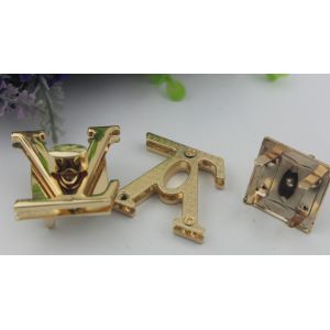 High polished zinc alloy gold plated V letters handbag twist lock