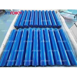 Wear resistant return roller conveyor component for stable belt support