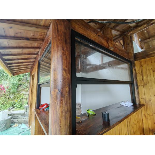 Lounge-Adjacent Folding Window Enabling Breezy Afternoon Naps with Adjustable Light Filtering