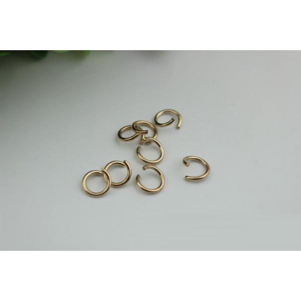 Buy 2018 Latest design simple durable 7 MM gold round shape metal iron wire buckles for clothes at wholesale prices