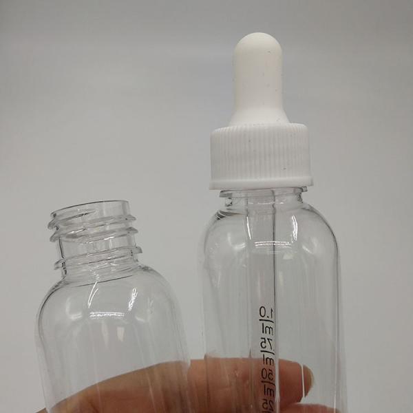 Buy Black Glass Dropper Bottles With Printed Design at wholesale prices