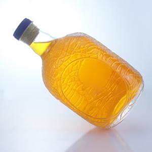 Unique Round Shape Embossed Food Grade Rum Vodka Whisky Tequila Gin Glass Bottle