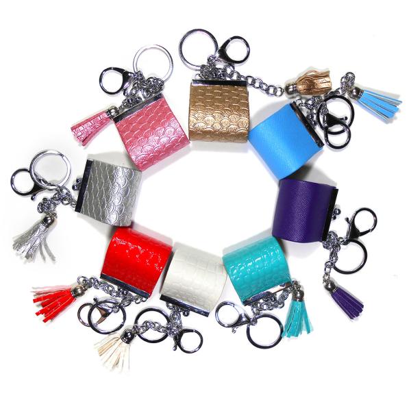 Buy Sliver Plating Smooth Surface Coin Bag Keychain With Red Tassel at wholesale prices