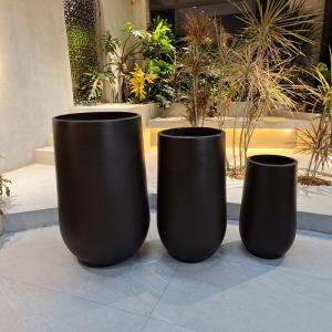 Effortlessly Elevate Your Plant Display With Fiber Clay Planters