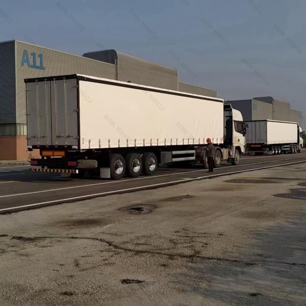 Buy 8.5t Steel Grade PVC Fabric Dry Van Cargo Curtain Side 3 Axle Semi-Trailer for Hauling at wholesale prices