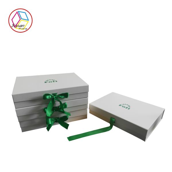 Buy Foldable White Box Green Logo Apparel Packaging Boxes With Ribbon at wholesale prices