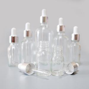 Quality SXT-05 30ml transparent essential oil Bottles empty glass bottles with button dropper pipette for sale