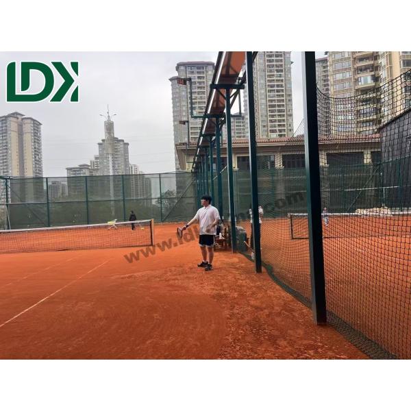 Padel court in use during professional tournament