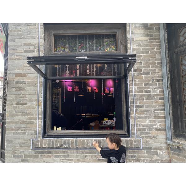 Water-Reflective Folding Window Design Amplifying Natural Light Through Strategic Shoreline Positioning