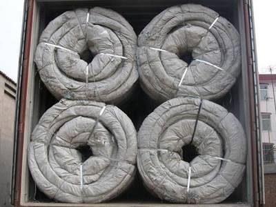 concertina wire coils in container