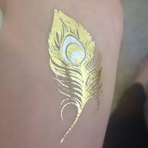 Metallic Jewelry tattoo