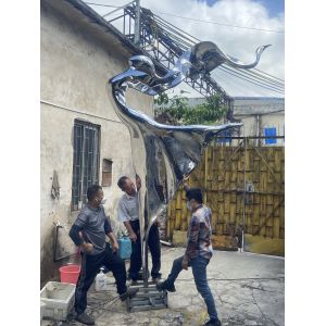 Outdoor garden courtyard decorated with stainless steel abstract sculpture