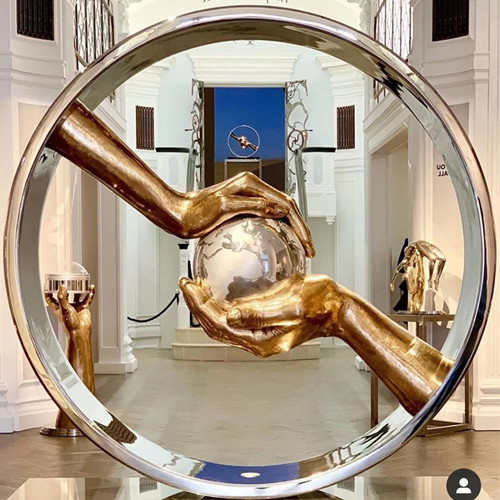 Buy Hand Polished Mirror Stainless Steel Guarding The Earth Sculptures at wholesale prices