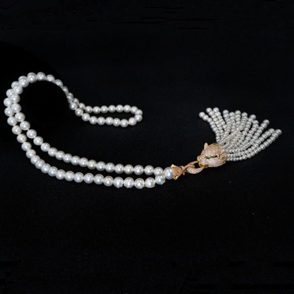 Buy Round Shell Pearl Necklace with Cubic Zirconia Tassel Charm Gold Plated (SN702142) at wholesale prices