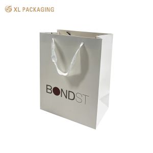 China XL Packaging Custom Packaging Factory Custom Own Logo 250gsm Art Paper Shopping Bag with White Ribbon and Inner Box on sale