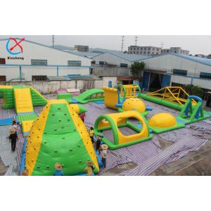 Customized Sea Or Lake 0.9mm Fireproof Inflatable Water Park Climbing Wall