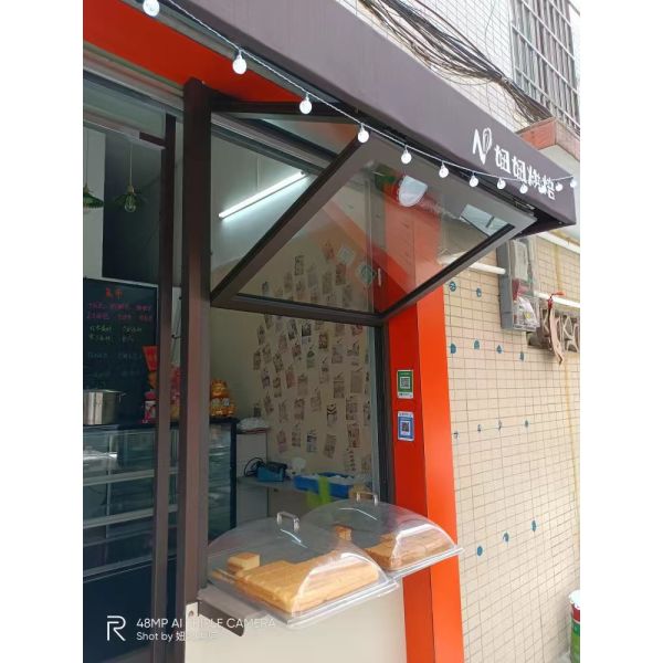 Companion Hearth Adjacent Folding Window Providing Supplemental Ventilation During Wood Burning Sessions