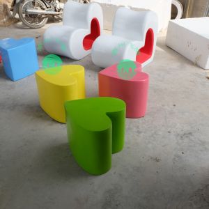 China Hotel mall deco  heart shape multi-color  fiberglass chair statue as functional furniture on sale
