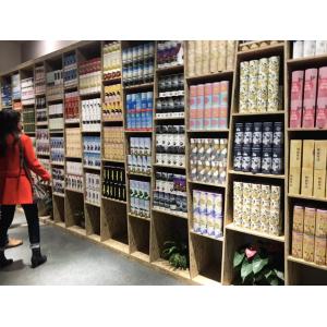 Facial tissue box packer machine with America Nordson glue applicator