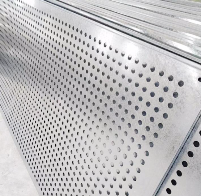 Perforated mesh panel installation in industrial equipment guarding application