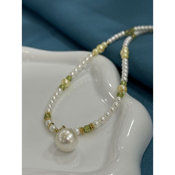 White light color round beads pendant necklace with a pendant size 14 mm and 72 cm chain length designed to add sophistication and charm
