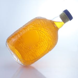 Unique Round Shape Embossed Food Grade Rum Vodka Whisky Tequila Gin Glass Bottle