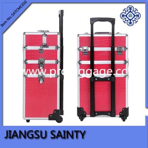 Beautiful pink crocodile beauty cases on wheels