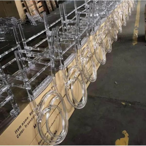 White acrylic Phoenix chair in banquet arrangement