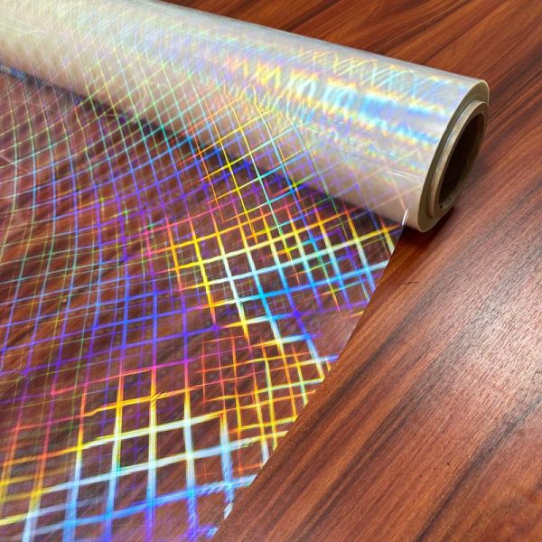 Multiple Extrusion Transparent Holographic Film For Soft Holographic Packing
