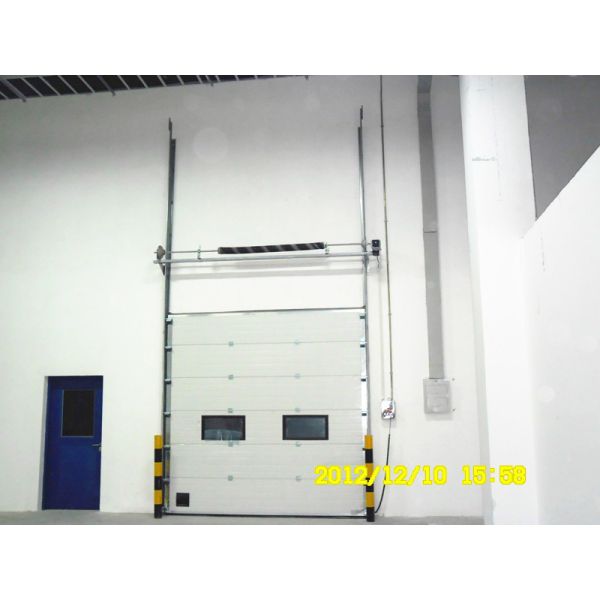 Outside Galvanized Steel Frame Industrial Sectional Doors With High frequency Motor