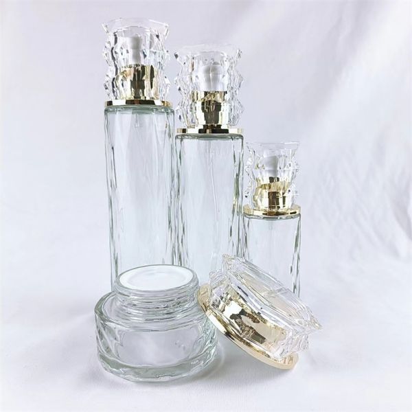 Buy 50ml 100ml Cosmetic empty glass jar with gold cap at wholesale prices