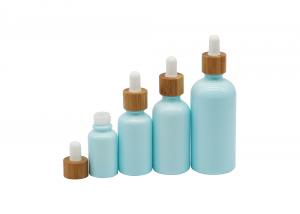 Quality Empty Cosmetic 100ml Mini Dropper Bottles With White Bamboo Dropper Cap for sale