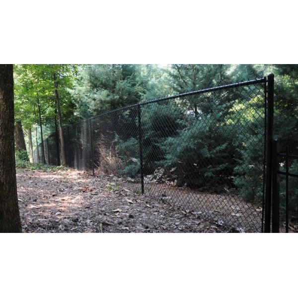 Black vinyl-coated security chain link fence for a landscape.
