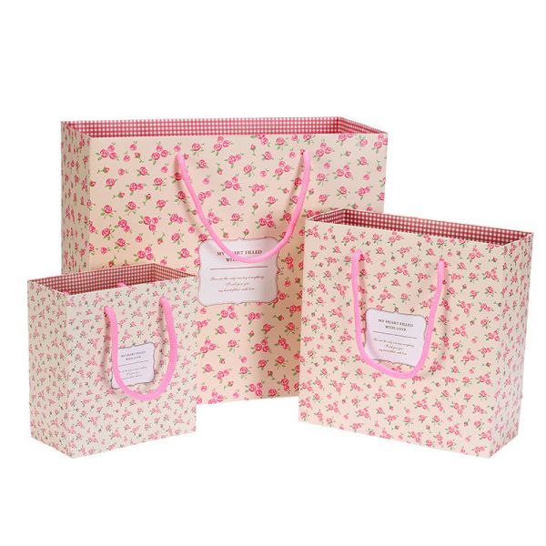 Buy Cheap paper bag packaging wedding gift packaging with rope handle at wholesale prices