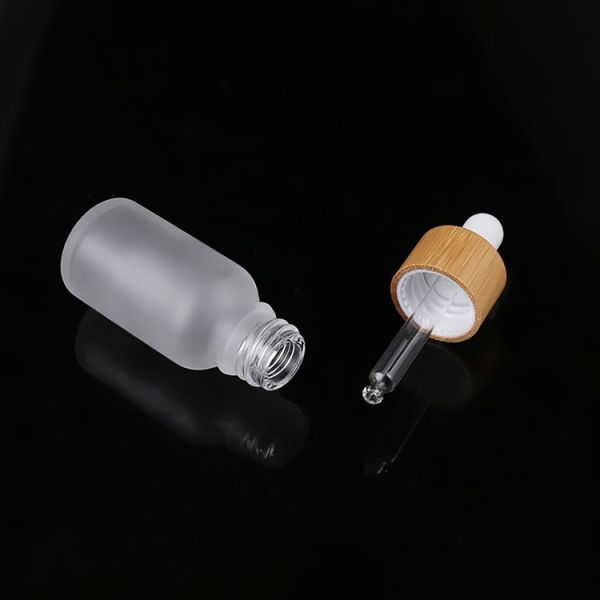 Buy White Glass Dropper Bottle With Bamboo Glass Pump at wholesale prices