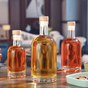 Quality 250ml Round Boston Glass Wine Bottle 8oz Vodka Bottle With Cork Lid for sale