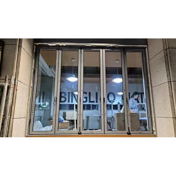 VineyardMist Wine Cellar Folding Window Capturing Morning Fog Patterns Over Grapevines from Tasting Rooms