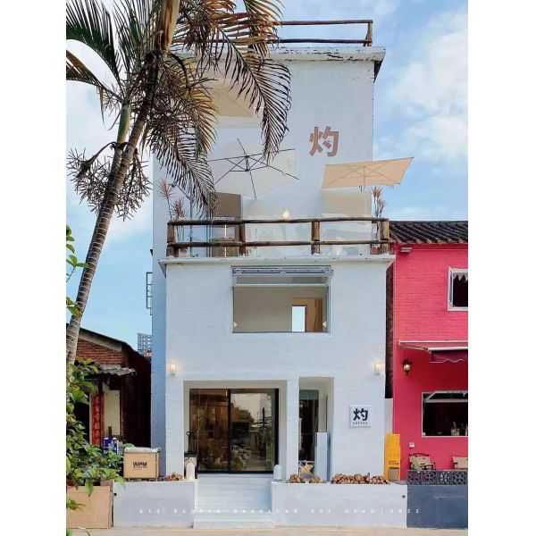 Dusk Wine Country Folding Window Framing Sunset Over Grapevines from Living Room Seating Areas