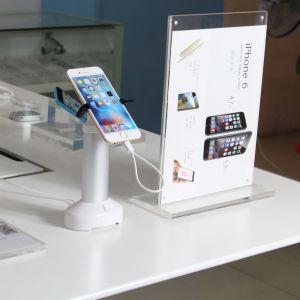 Comer mobile phone security stand with alarm sensor and charging cables for