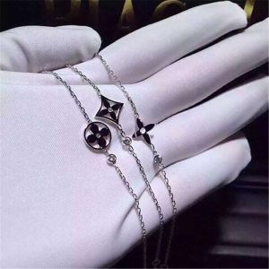 diamonds of logo bracelet 18kt gold with white gold