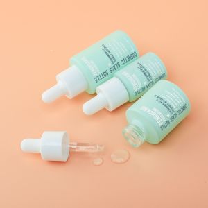 FDA Glass Cosmetic Packaging Set Dropper Pump Spray Painting Green Color 20ml