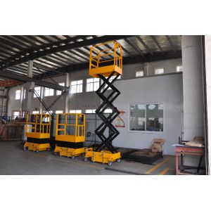 Long Using Period Mini Mobile Scissor Lift With 200Kg Loading And Yellow Color