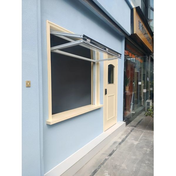 Grape Arbor Folding Window Connection Allowing Harvest Access from Kitchen Preparation Areas